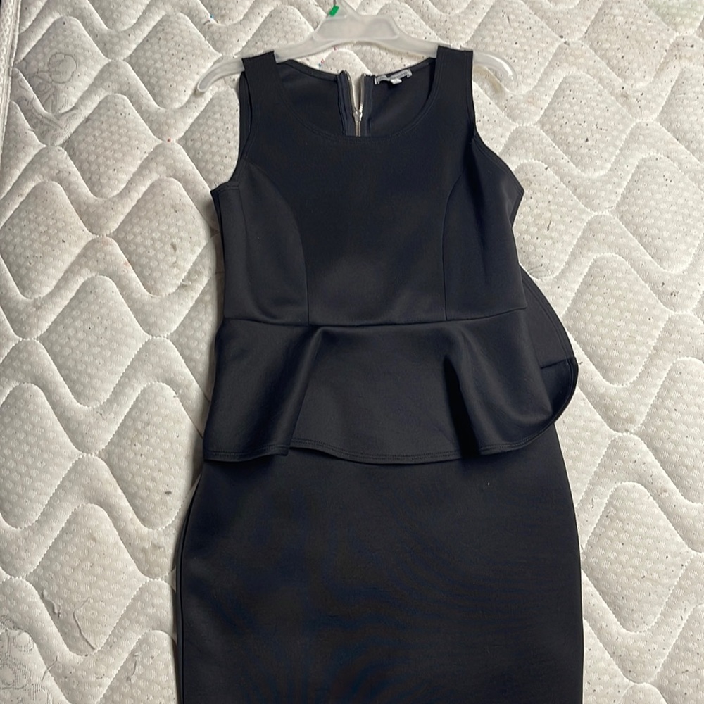 A black dress with a zipper on the back from Charlotte russe